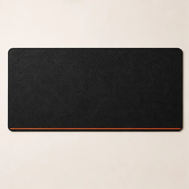 Black pro gaming mat with dense contour lines and an orange accent stripe